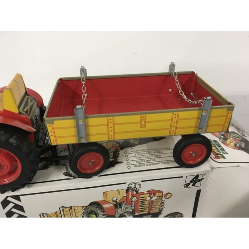 479 - A boxed Fetor clockwork Tractor and Trailer . No key. No reserve