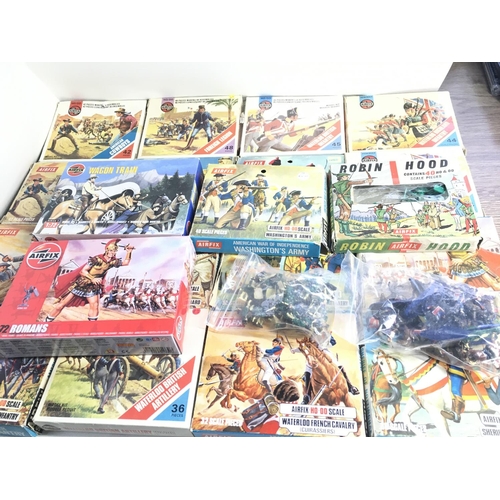 484 - A collection of Airfix plastic figures including 20 boxed sets and 2 bagged sets. Includes..cowboys.... 