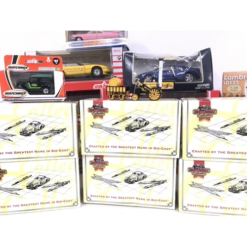 498 - A Collection of Boxed Diecast including Burago. Maisto. Dinky. Matchbox etc.