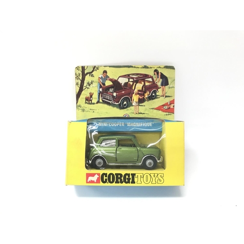 61 - A Boxed Corgi Mini-Cooper Magnifique. #334.