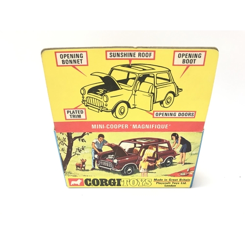 61 - A Boxed Corgi Mini-Cooper Magnifique. #334.