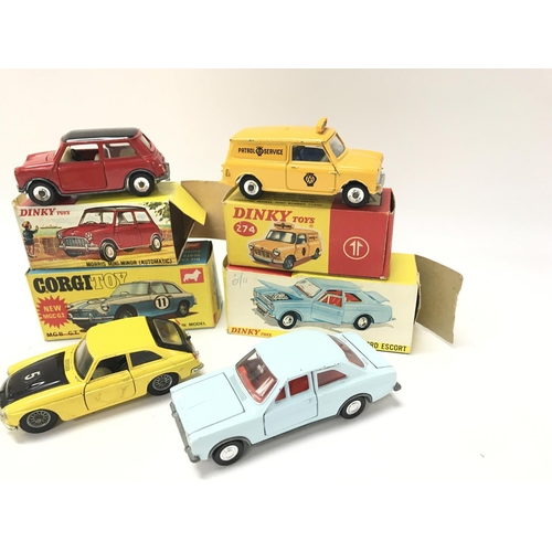 64 - A Boxed Dinky Morris Mini-Minor #183. An A.A. Mini Van #274. A Ford Escort #168 and a MGC GT (No Cas... 