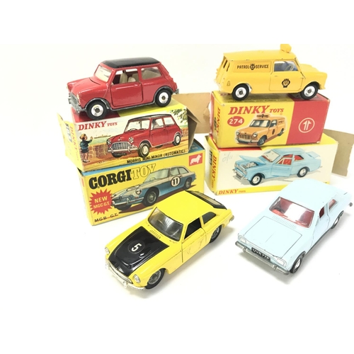 64 - A Boxed Dinky Morris Mini-Minor #183. An A.A. Mini Van #274. A Ford Escort #168 and a MGC GT (No Cas... 