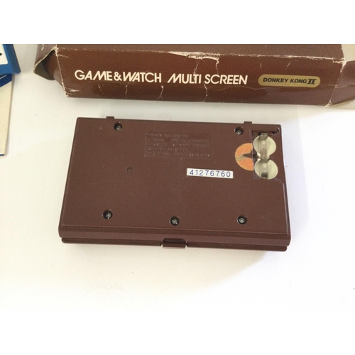 725 - A Boxed Nintendo Donkey Kong Multi Screen , missing battery cover, a unboxed Gakken Donkey Angler wi... 