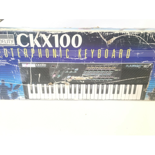 729 - A Boxed Amstrad CKX100 Keyboard. Box Is Worn. NO RESERVE