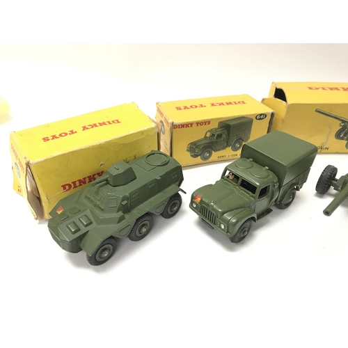 79 - 4 Boxed Dinky Military Vehicles. A Armoured Personnel Carrier #676. A Army 1-ton Cargo Truck #641. A... 