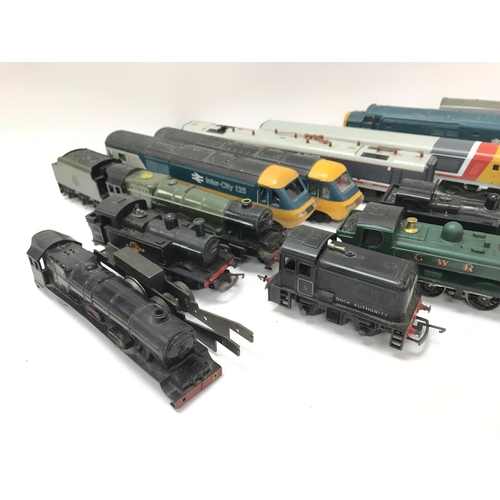 92 - A Box Containing a Collection of 00 Gauge Locomotives. Rolling Stock and Coaches. Ideal for spare pa... 