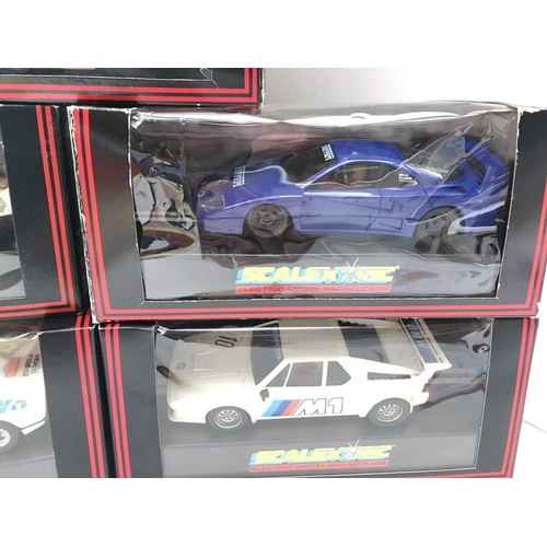 1011 - 5 Boxed Scalextric Cars. Including a Jaguar XJ220.