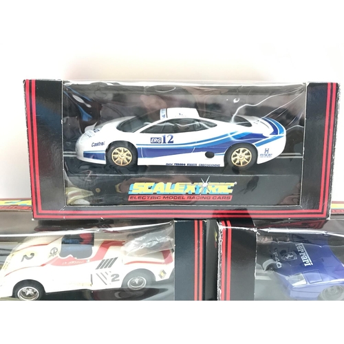 1011 - 5 Boxed Scalextric Cars. Including a Jaguar XJ220.