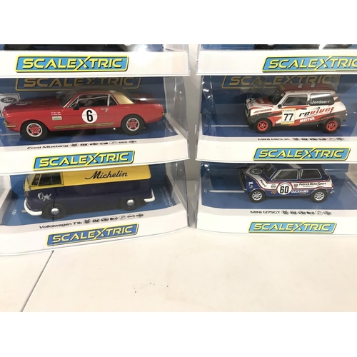 1026 - 6 Boxed Scalextric Cars. 2 X Ford Mustangs. A Volkswagen T1B. 2X Mini Miglias and a Mini 1275GT.