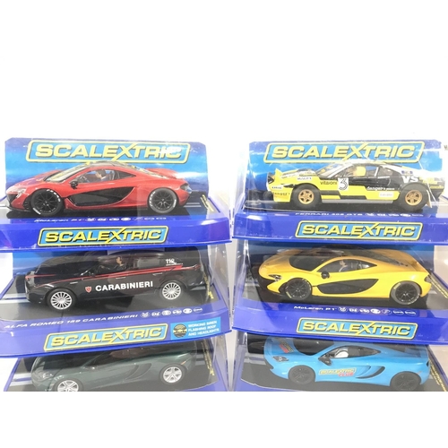 1029 - 6 Boxed Scalextric Cars. 2 X McLaren MP4-12C. A Alfa Romeo 159 Carabinieri. 2 X McLaren P1. And a Fe... 