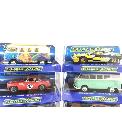 1040 - 6 Boxed Scalextric Cars. Including 2 X Volkswagen Camper Vans. A Aston Martin DBS. A MG 1964 Searing... 