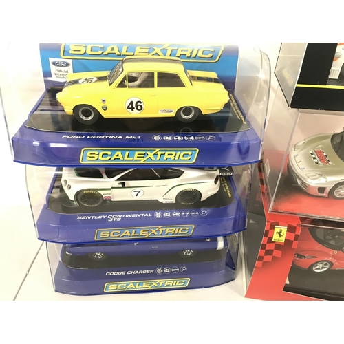 1052 - 6 X Boxed Slot Cars including Scalextric. SCX and Carrera.