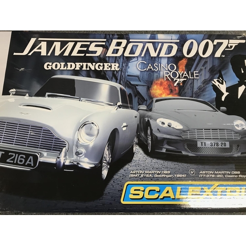 1034 - A Boxed Scalextric James Bond Goldfinger/ Casino Royal Set. Outer Box is Worn. Sealed inside.