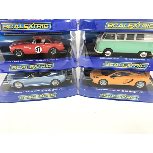 1040 - 6 Boxed Scalextric Cars. Including 2 X Volkswagen Camper Vans. A Aston Martin DBS. A MG 1964 Searing... 