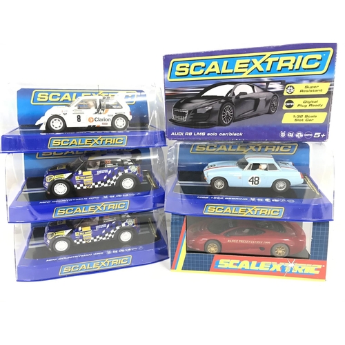 1041 - 6 X Boxed Scalextric Cars. A MG Metro 6R4. 2 X Mini Countryman WRC. A Audi R8 LMS Solo Car. A MGB 19... 