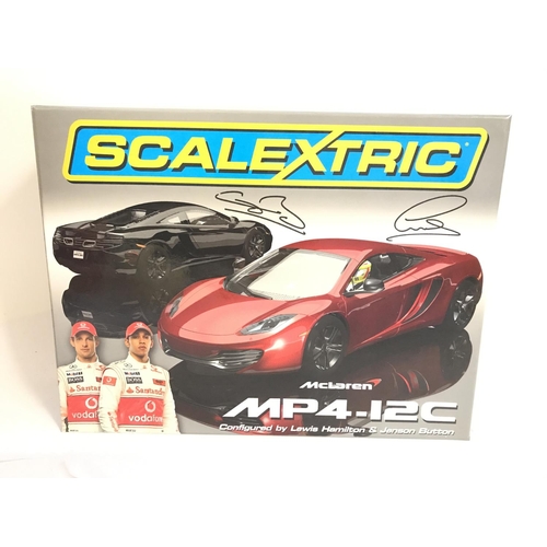 907 - A Boxed Scalextric McLaren MP4-12C Twin Set.