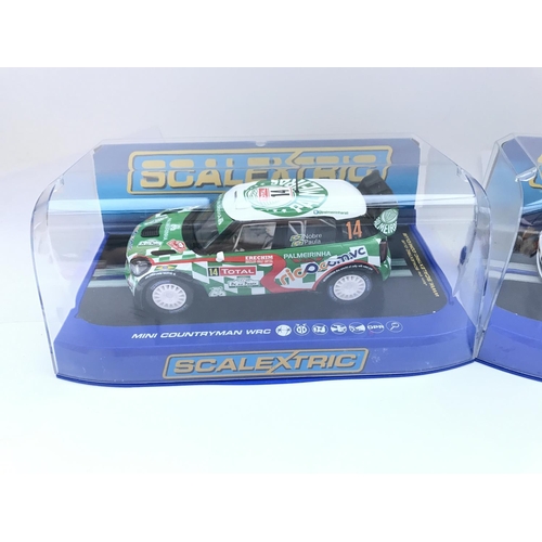 915 - 2 X Boxed Scalextric Cars. Both Mini Countryman WRC.