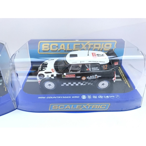 915 - 2 X Boxed Scalextric Cars. Both Mini Countryman WRC.