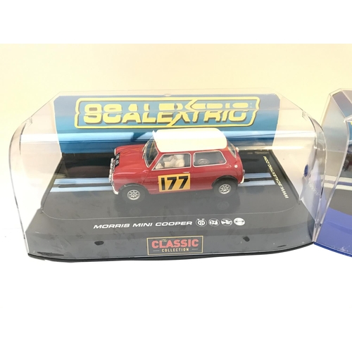 917 - 2 X Boxed Scalextric Minis. A Morris Mini Cooper and a Mini Cooper s.