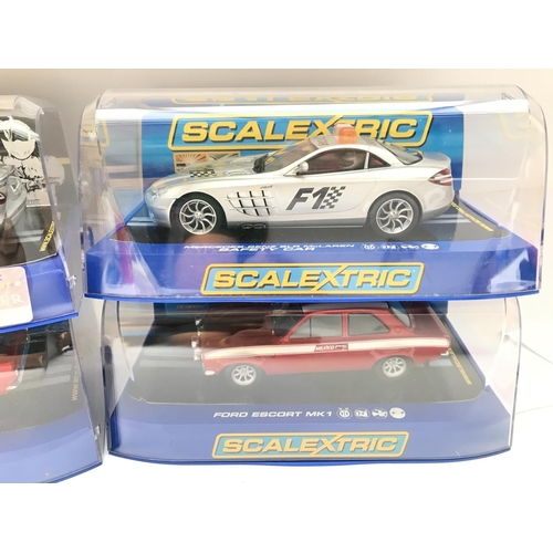 922 - 4 Boxed Scalextric Cars including A Ford Cortina. Ford Escort. A Mercedes-Benz SLR McLaren and a Mer... 