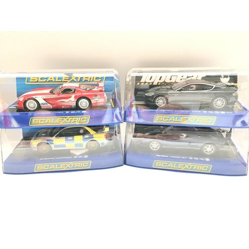 923 - 4 X Boxed Scalextric Cars. A Dodge Viper. A Aston Martin DBS. A Subaru Impreza. An a Ford GT.