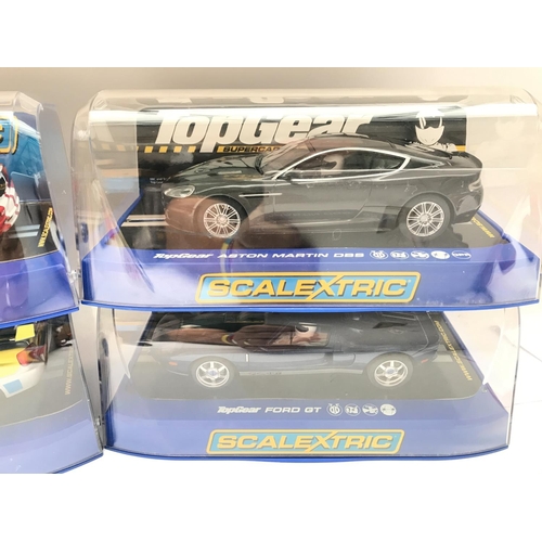 923 - 4 X Boxed Scalextric Cars. A Dodge Viper. A Aston Martin DBS. A Subaru Impreza. An a Ford GT.