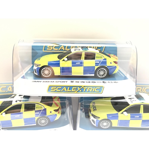 932 - 3 X Boxed Scalextric BMW 330i M-Sports Police Cars.