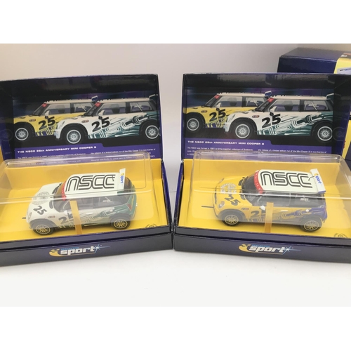 938 - 4 X Boxed Scalextric Sport Cars. 2X Minis. A Mitsubishi Lancer Evolution and a Peugeot 307 WRC.