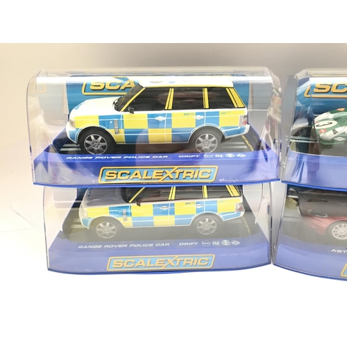 945 - 4 x Boxed Scalextric Cars 2 X Range Rover Police Cars. A Ferrari 330 P4 and a Aston Martin DB5.