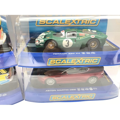 945 - 4 x Boxed Scalextric Cars 2 X Range Rover Police Cars. A Ferrari 330 P4 and a Aston Martin DB5.