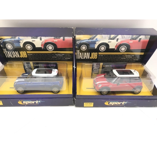 946 - 4 X Boxed Scalextric Cars. Including 2 Italian Job Minis. A Subaru Impreza and a Ford GT MK II.