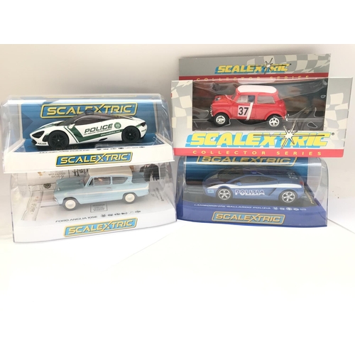 955 - 4 X Boxed Scalextric Cars. A McLaren 720s Police Car. A Harry Potter Ford Anglia 105E. A Mini Cooper... 