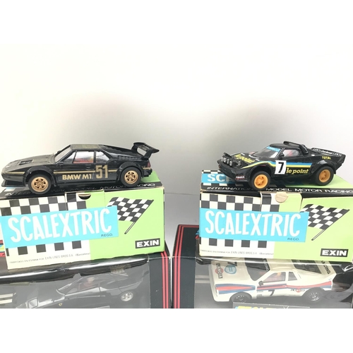 957 - 4 X Boxed Scalextric Cars including a Spanish BMW M1. A Spanish Lancia S. Le Point. A Martini Lancia... 