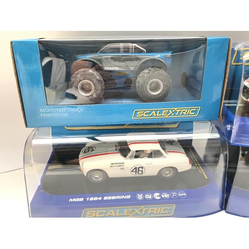 980 - 4 Boxed Scalextric Cars including 2 MGB 1964 Sebring. An Audi R8 LMS and a Monster Truck Predator.