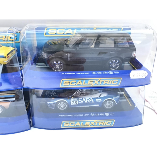 994 - 4 X Boxed Scalextric Cars a Ford Escort MK1. A Range Rover. A Ford GT40 and a Ferrari F430 GT.