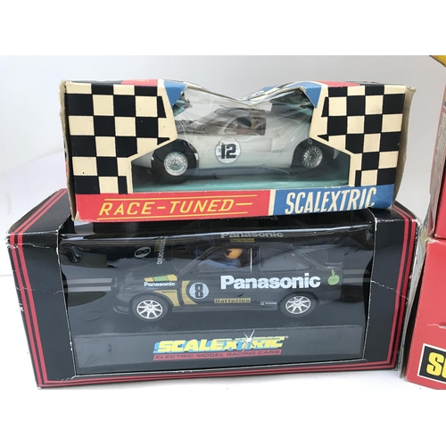 995 - 4 X Boxed Scalextric Cars. A Ford GT. A Ford Escort Cosworth. A Porsche 935 and a NcLaren F1.