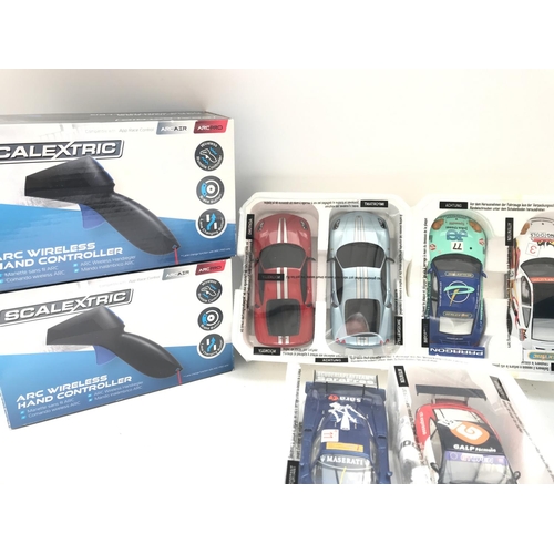 997 - 3 X Boxed Scalextric Wireless Controllers and 6 Cars.