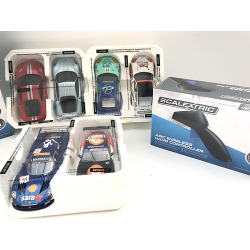 997 - 3 X Boxed Scalextric Wireless Controllers and 6 Cars.