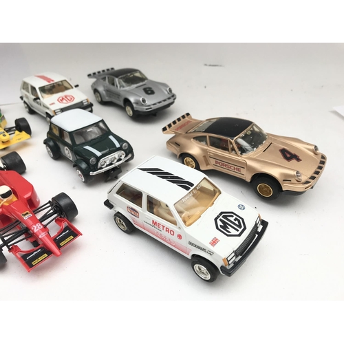 999 - A Collection Of Scalextric Cars Including MG. Mini. Porsche. Etc.