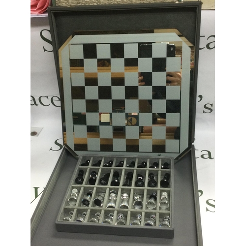 1010 - A Swarovski chess set, one piece a/f. Shipping category D.