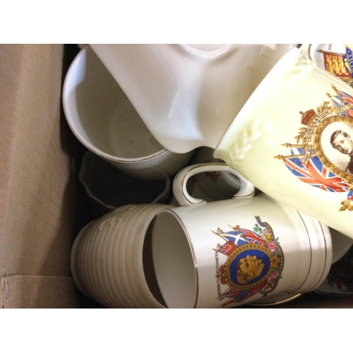 1045 - A large collection of assorted Royal commemorative jugs and mugs.