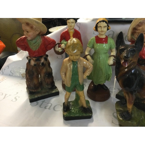 1051 - A collective lot of assorted ceramics including a German Shepard figurine. Postage D