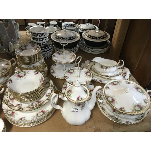 1057 - A large collection of Royal Albert tea and dinner ware, comprising tureens, two cake stands, coffee ... 