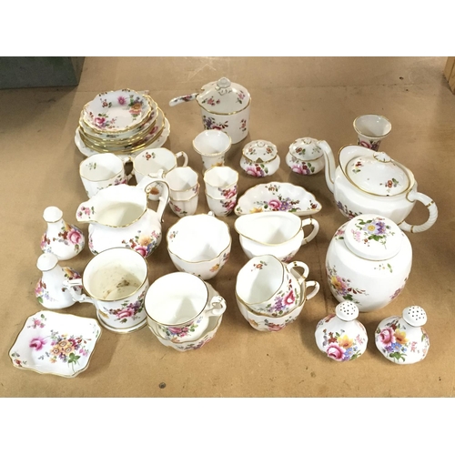 1059 - A collection of Royal Crown Derby, Derby Posies pattern including cups and saucers etc. this lot can... 