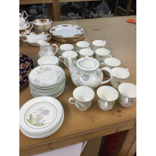 1075 - A Royal Albert Spring dawn pattern tea set including cups, saucers, tea jug etc. this lot cannot be ... 