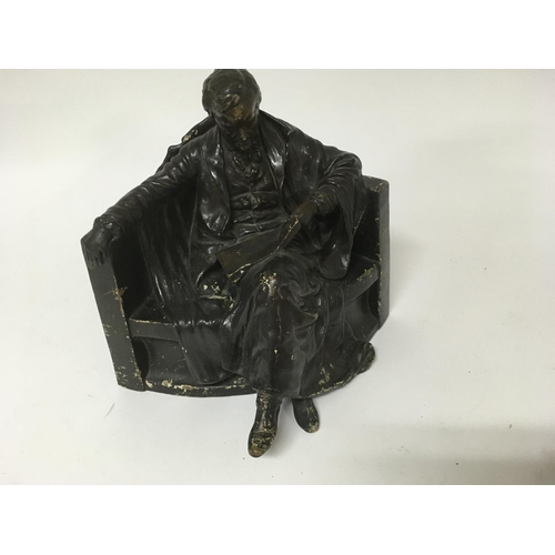 1080 - A goldscheider figure in the form of a Gentleman seated . 26 cm .