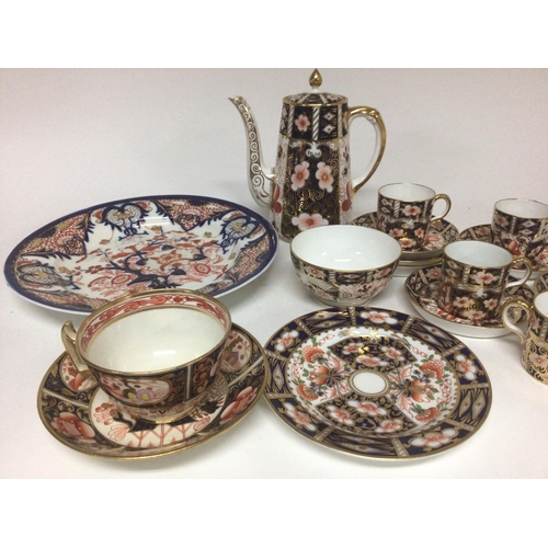 1092 - A Royal Crown Derby Porcelain coffee set with coffee pot one cup cracked and other conforming cerami... 