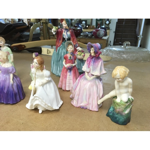 1099 - A collection of eight Royal Doulton figurines.