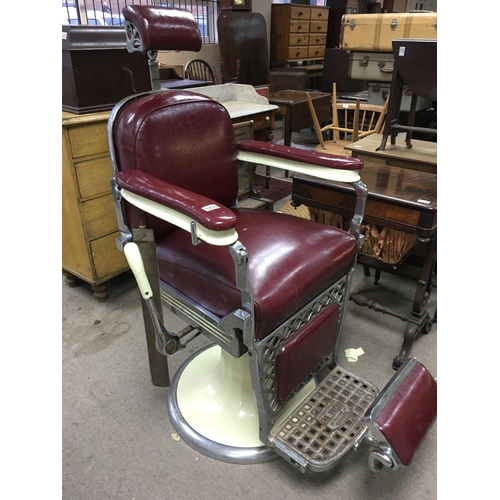 1206 - A Quality and rare Vintage 1930s Professional American barbers chair with a deep red upholstery and ... 